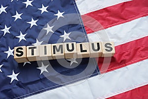Stimulus package is shown using the text and photo of the flag of USA