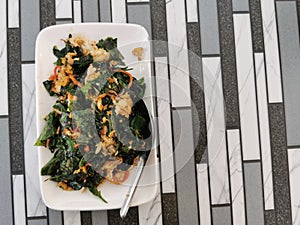 Stir fried baegu leaf with egg