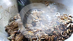 Stir-fried Barometer Earthstar mushroom, or Astraeus hygrometricus, so call `Het Top` in Northern Thai dialect