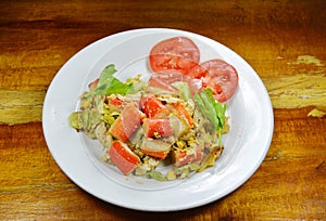 Stir fried cabbage with crab stick and egg on dish