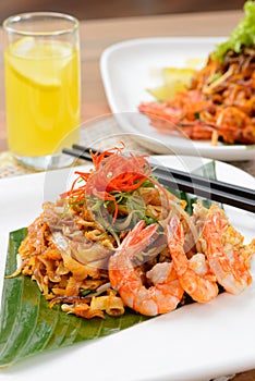 Stir fried char kuey teow