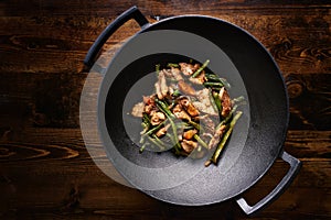 Stir fried chicken in cast iron wok