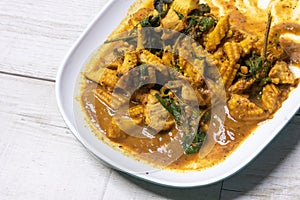 Stir-fried chicken with soft fried rice. Flip the curry in the south of Asia. thailand street food with a spicy, aromatic,