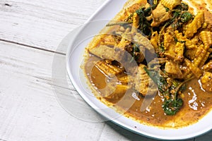 Stir-fried chicken with soft fried rice. Flip the curry in the south of Asia. thailand street food with a spicy, aromatic,