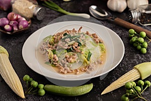 Stir Fried Chinese Cabbage with Minced Pork in White Dish. Selective focus