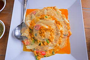 Stir-fried crab meat with curry powder, Thai food.