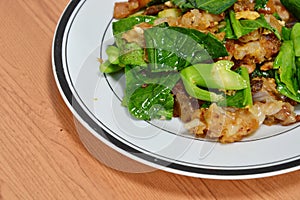 Stir fried flat noodle and pork with preserved soy bean paste