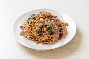 stir-fried instant noodles with Thai basil and minced pork