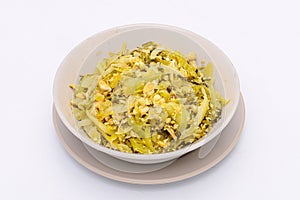 Stir-Fried Pickled Mustard Green with Egg in a bowl on a white isolated background. Thai food. Top view.