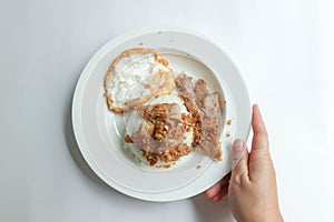 stir fried pork with garlic , pork and rice or deep fried pork or fried pork with rice and sunny side up egg or fried egg photo