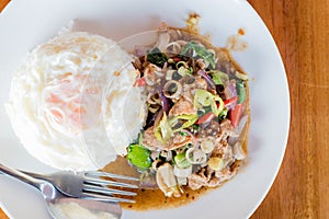 stir-fried pork and herb with rice or stir-fried Jango, Thai foo