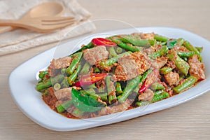 Stir fried pork with yard long bean and red curry paste, Thai food