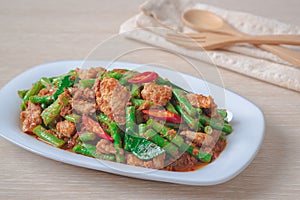 Stir fried pork with yard long bean and red curry paste, Thai food