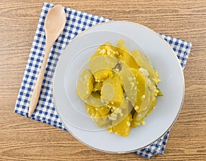 Stir Fried Pumpkin with Egg in White Dish