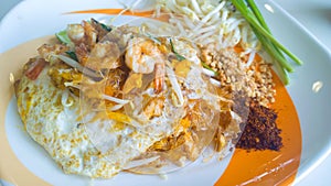 Stir-fried rice noodles with egg, vegetable and shrimp Pad Thai