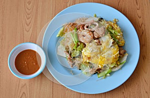 Stir fried seafood sukiyaki with egg and sauce