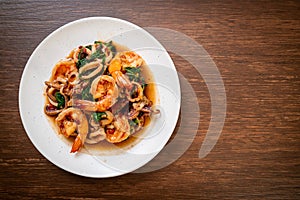 stir-fried seafood with Thai basil