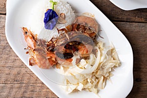 Stir Fried Shrimp with Tamarind Sauce with Rice with studio light delicious looking