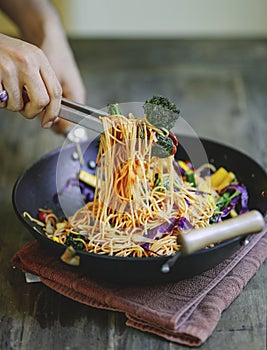 Stir fried spaghetti with organic vegetables