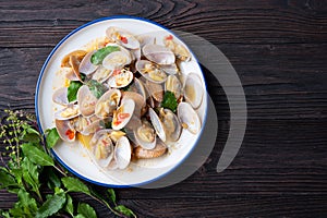 Stir fried Spicy Clam (Surf clam, Short necked clam, Carpet clam, Venus shell, Baby clam) with Thai Holy Basil