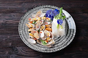 Stir fried Spicy Clam (Surf clam, Short necked clam, Carpet clam, Venus shell, Baby clam) with Thai Holy Basil With  Steamed Rice