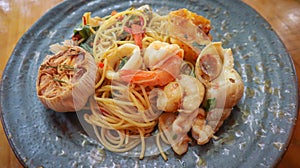 Stir-fried spicy seafood pasta Thai style Spaghetti Pad Kee Mao Talay