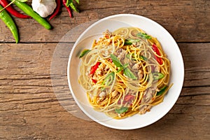 Stir fried spicy spaghetti with minced chicken and basil,Pad Kra Pao photo