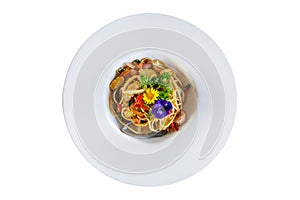 Stir-fried spicy spaghetti with seafoods on white background