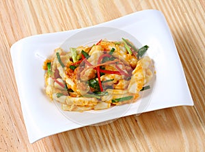 Stir fried squid with salted egg yolk