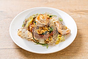 Stir-fried vermicelli with vegetables and seafood  in sukiyaki sauce