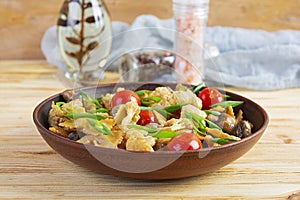 Stir fry farfalle pasta with vegetables, cauliflower and mushrooms