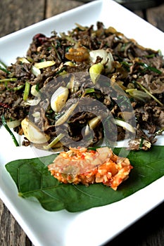 Stir fry Spilt Gill Fungus with white chillies and local onion.