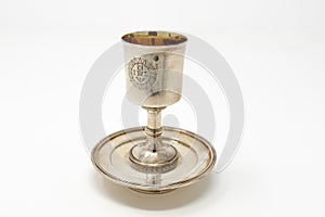 A stirling silver communion chalice to hold the wine during Holy