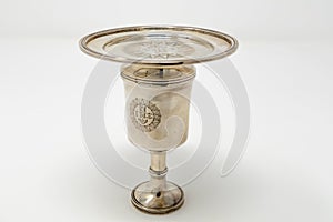 A stirling silver communion chalice to hold the wine during Holy