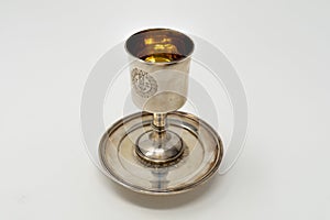 A stirling silver communion chalice to hold the wine during Holy