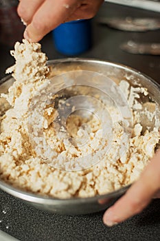 Stirring ingredients to make dough