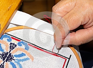 Stitching a needlepoint project