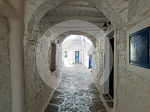 Stoa with shelter and arch over at Chora village, Kithnos island, Greece