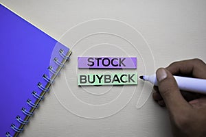 Stock Buyback text on sticky notes with office desk. Stock Market Exchange Concept