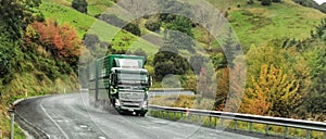 Stock carrier truck on a rural highway on the South Island of New Zealand