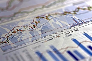 Stock graph printed on paper. Close-up view illustrating economic concepts, stock market fluctuations, and trading photo