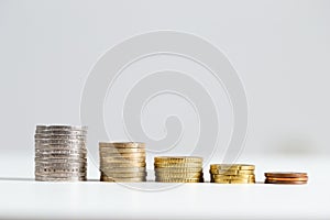 Stock of euro money in-line on white background with copy space