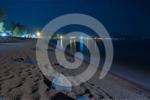 Serene Nighttime Scene of a Superior Sandy Beach, Generative AI