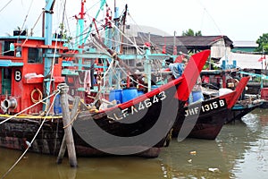 Stock image of Colorful chinese fishing boat resting at a Chinese Fishing Village, Sekinchan, Malaysia