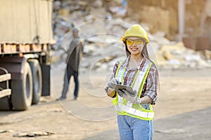 Stock keeper girl Currently using the product tablet Before exporting for sale