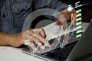 Stock market chart business using a computer to analyze online trading data.Forex graph  financial and investment on a virtual