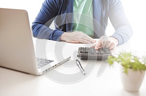 Stock market chart and finger pointing on tablet in office