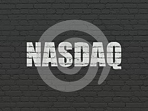 Stock market indexes concept: NASDAQ on wall background photo
