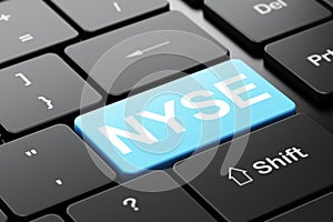 Stock market indexes concept: NYSE on computer keyboard background