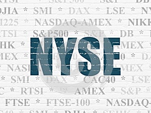 Stock market indexes concept: NYSE on wall background photo